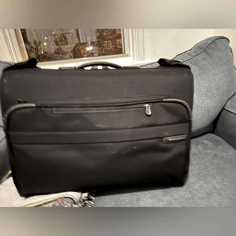 Black BRIGGS & RILEY Baseline 21” Carry-On Wheeled Garment Bag